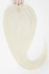 A hand holds up a long, straight synthetic hair extension piece in a very light platinum blonde color against a plain white background.