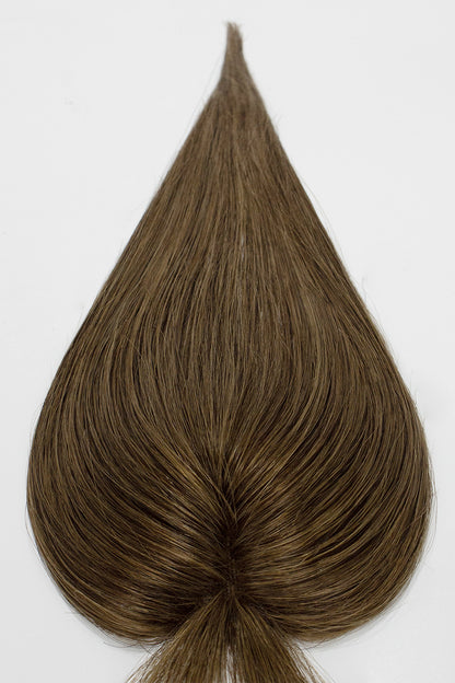 Brown hair color swatch on a white background