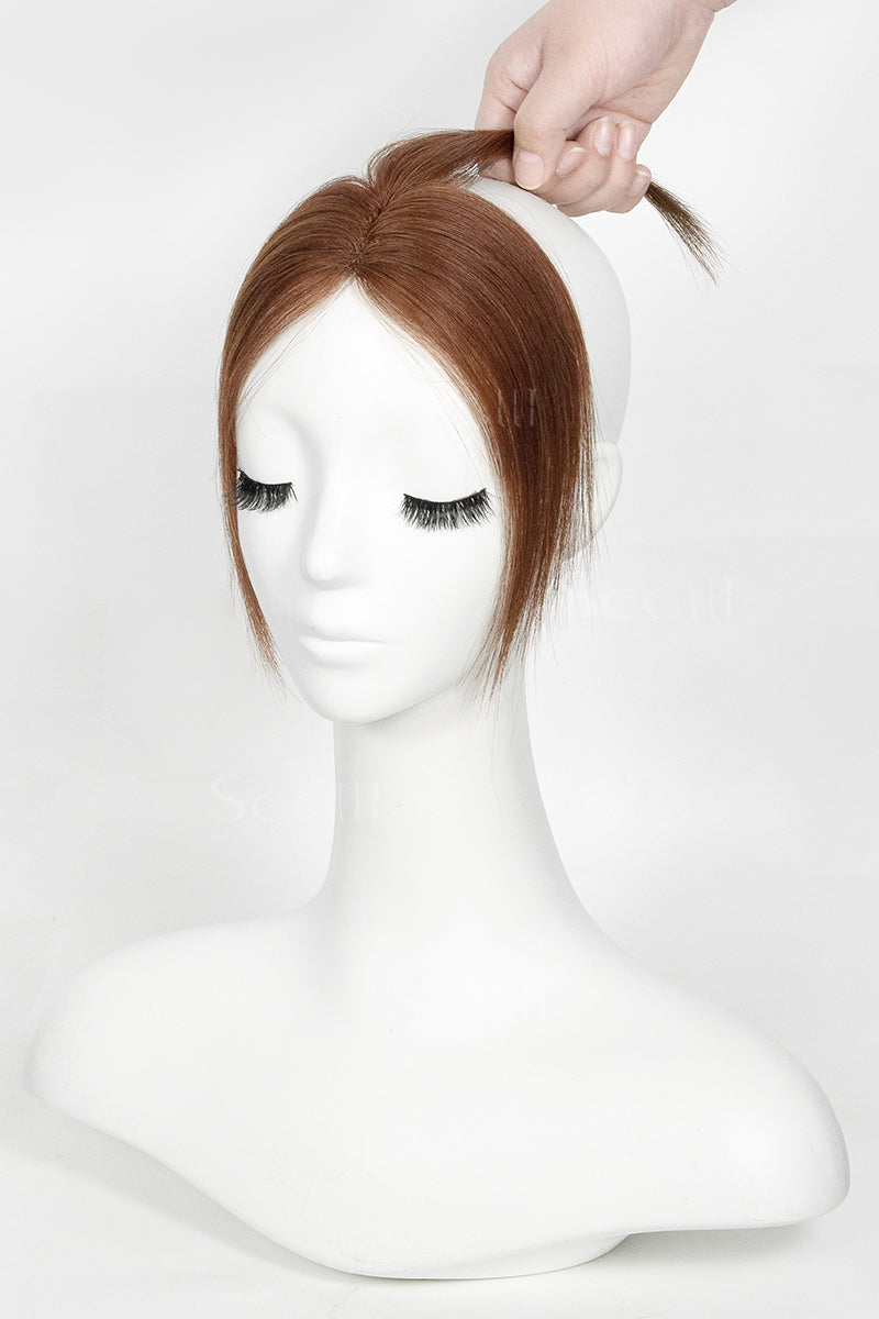 Mannequin head with a Magic Pixie Topper Dark Auburn Brown 