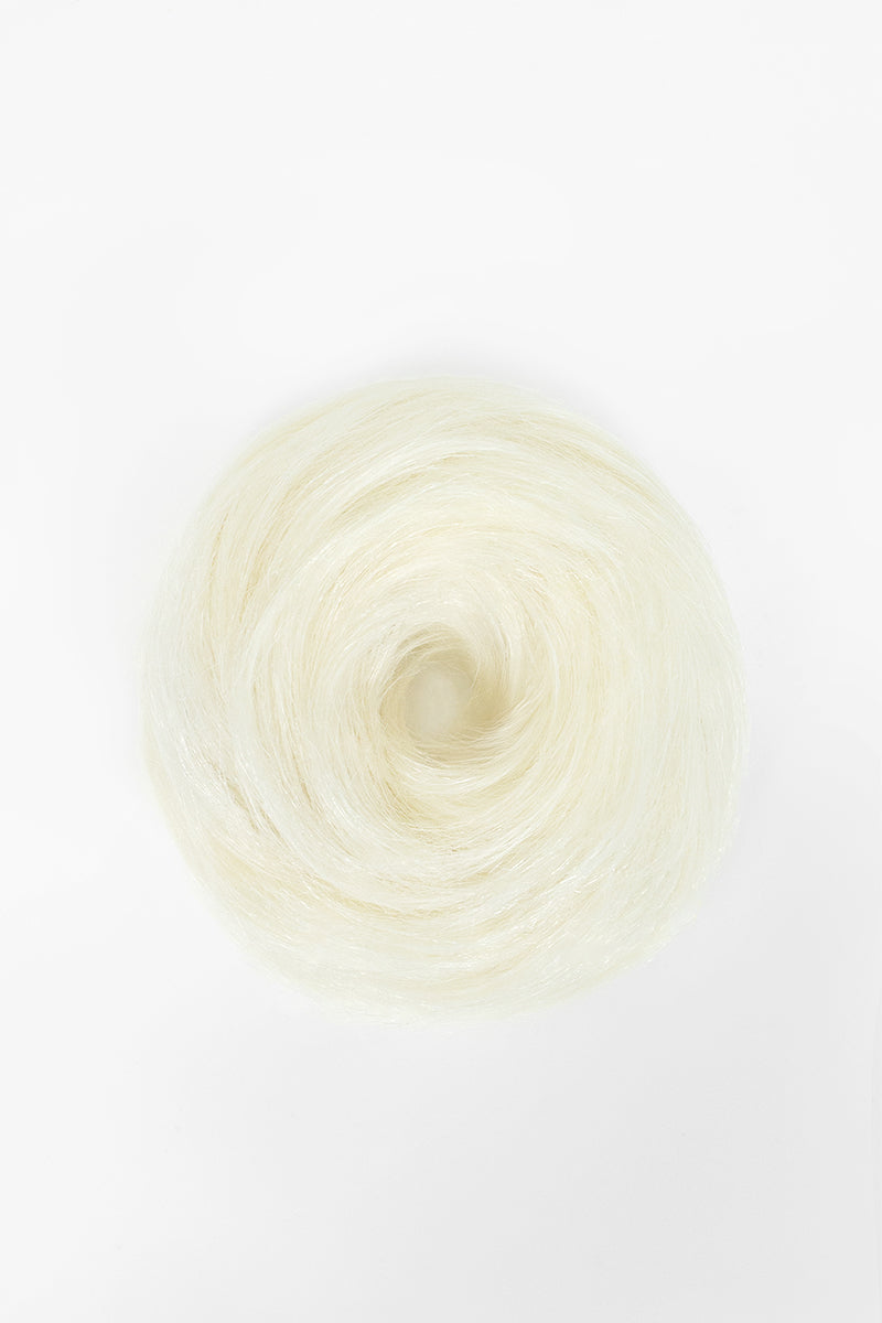 White blonde hair scrunchie arranged in a circular bun shape on a white background.